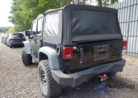 2011 Jeep Wrangler Unlimited Rubicon from USA, damaged, VIN 1J4BA6H18BL519525